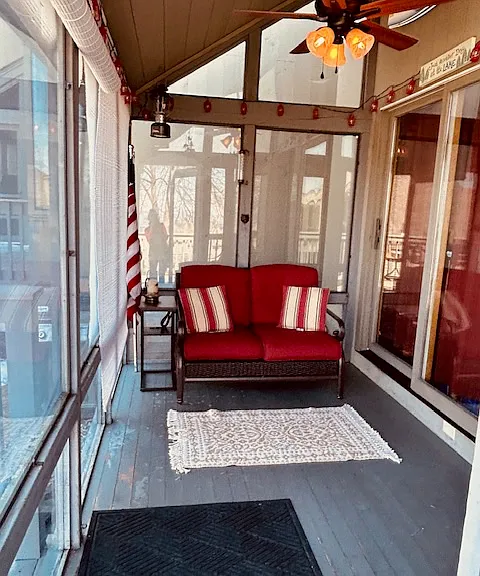 Temperature controlled porch-a perfect spot to curl up with a book.