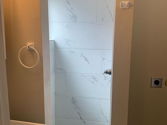 Bath showing laundry area