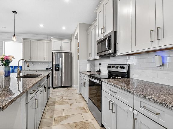 2nd image of 6613 Pointe Of Woods Drive