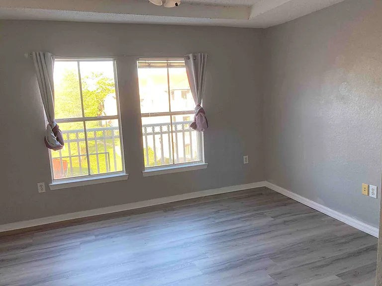 The master bedroom with new installed Vinyl plank floor