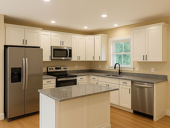 Full sized kitchen with granite countertops dishwasher electric stove, full sized fridge and island that seats 2