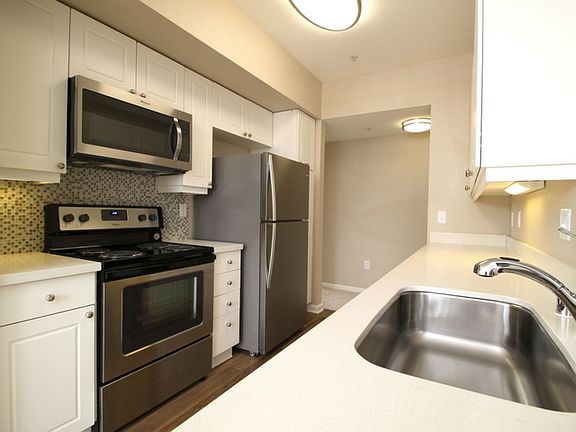 Two-Bedroom Gallery-Style Kitchen in select units.