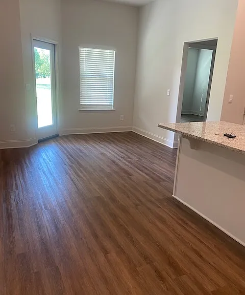 Breakfast Area from Kitchen, door to Patio, window