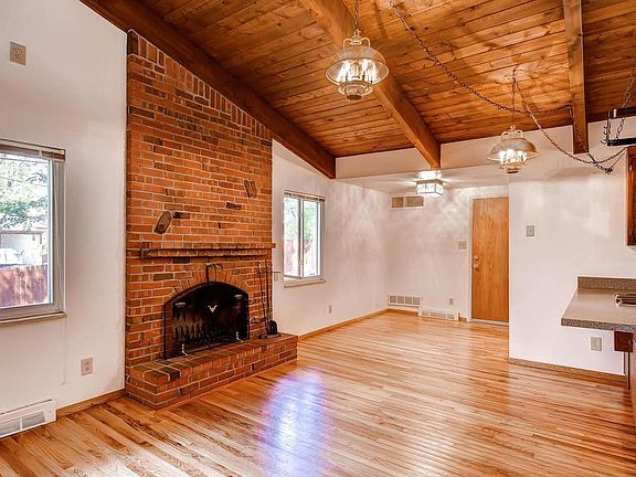 Fireplace in kitchen. Back door to garage and back yard. You cant see it but the washer-dryer room is just to the right of the back door.