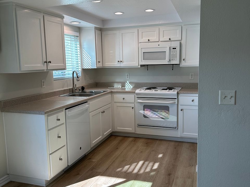 Built-in stove, microwave and dishwasher.