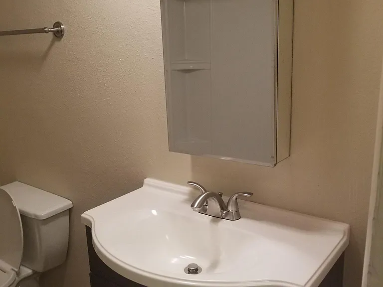 Upgraded cabinets and plumbing hardware