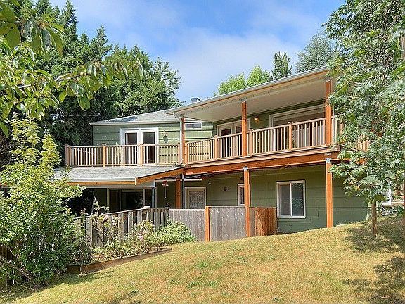 On a double lot that gently slopes away from the home. Room to grow vegetables or park the toys