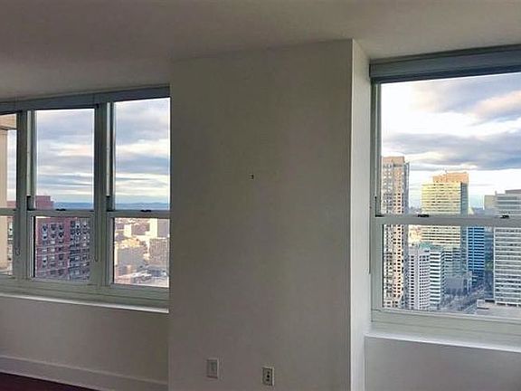 Views from master bedroom which comes with preinstalled modern blackout shades and a large closet.