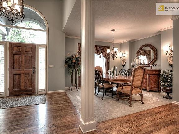 Warm and inviting entry with wood floors
