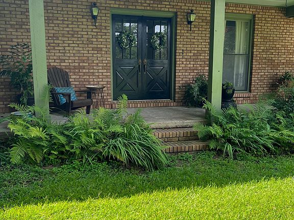 Front door and additional door from parking
