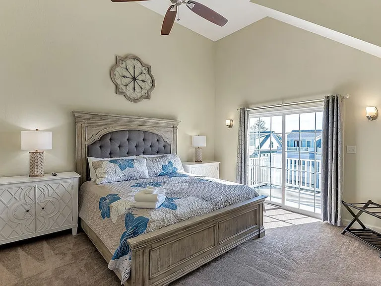Master Bedroom with patio attached to enjoy watching sunrise or sunsets!