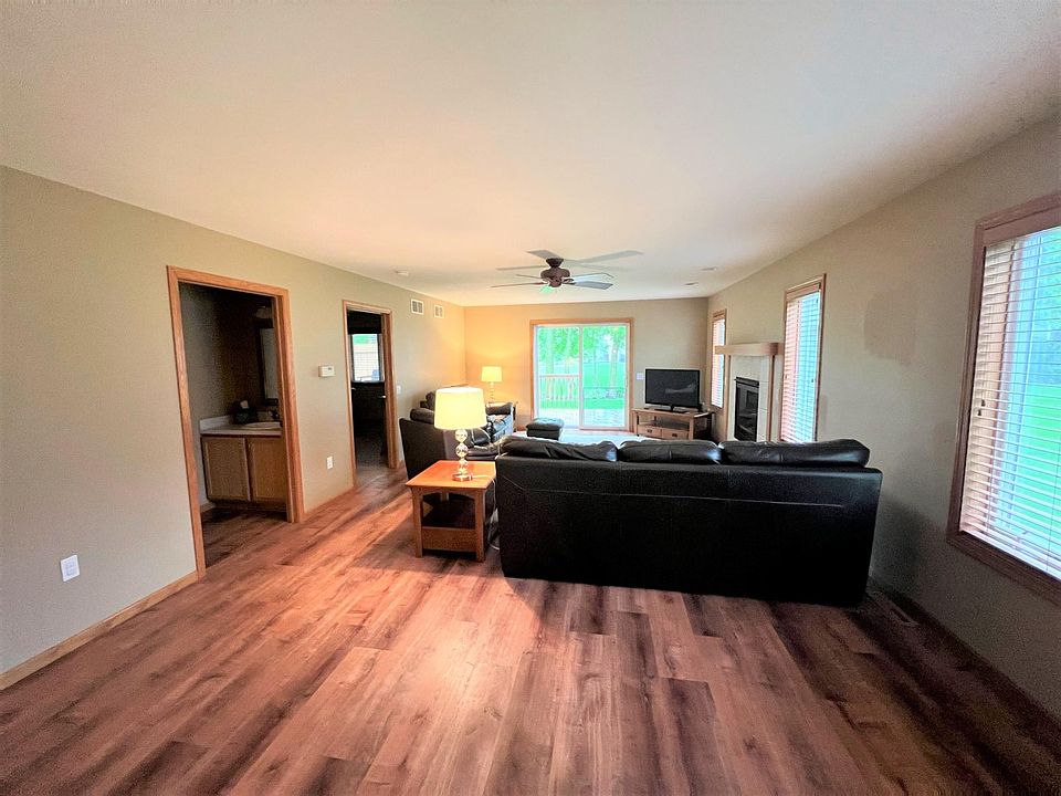 Huge duplex with tons of storage/living space. Main level living room and 1/2 bath with walkout to wood deck
