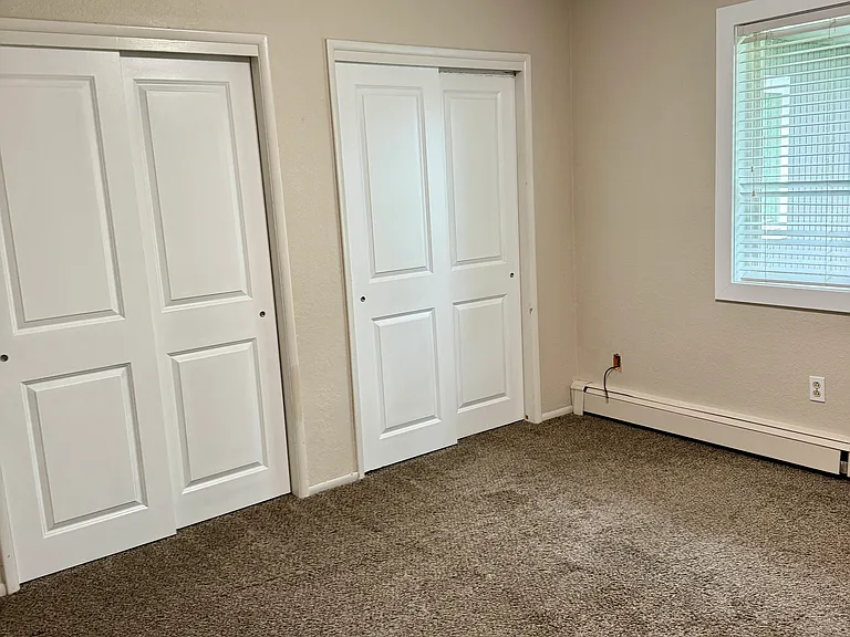 Primary Bedroom with double closets