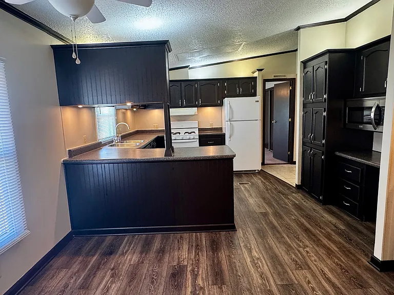 Kitchen from Grate room/Dining area