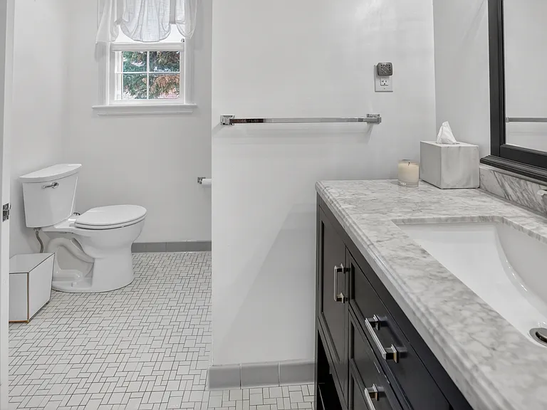 Main level full bathroom.