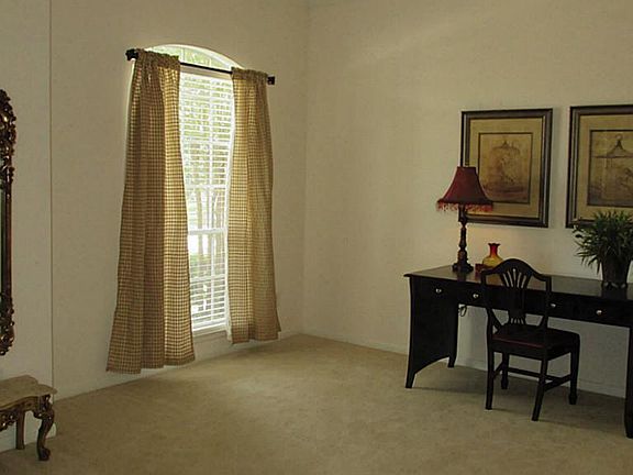 Front den will be perfect for a formal sitting area with your finest furnishings.