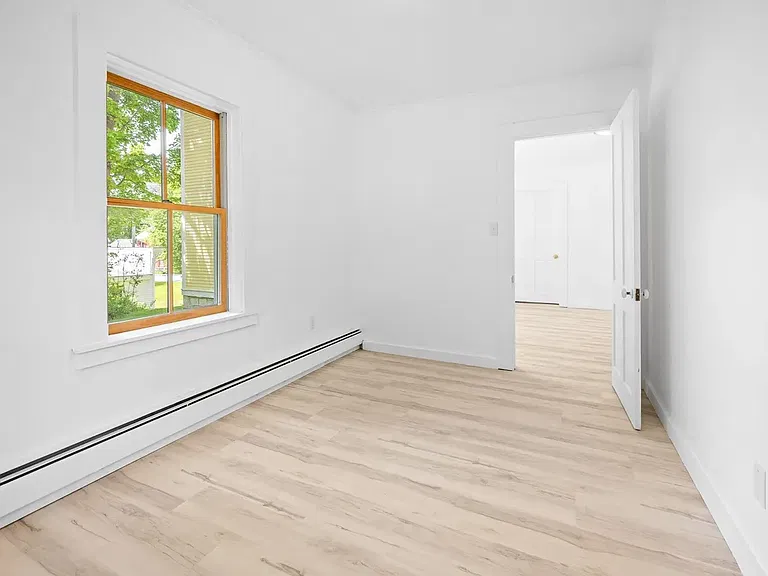 Bedroom Two - First Floor. Space for a queen bed or two twins with headboard to the right in this photo.