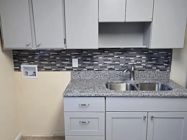 Kitchen Sink and Cabinets