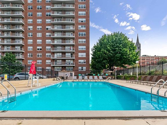 Swimming pool, sundeck, and grilling area