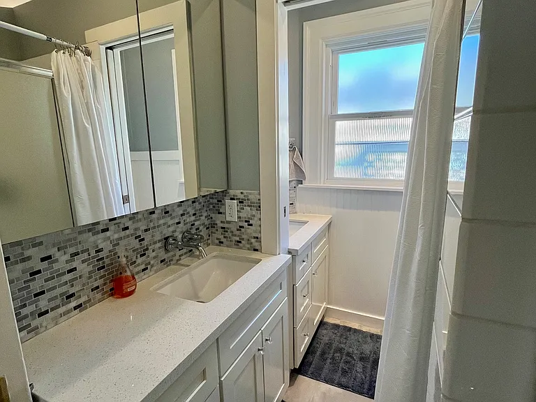 2nd floor female shared bath with double sinks