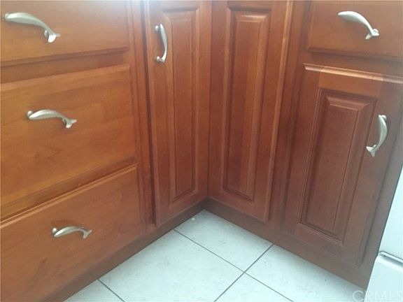 Hard wood cabinets.