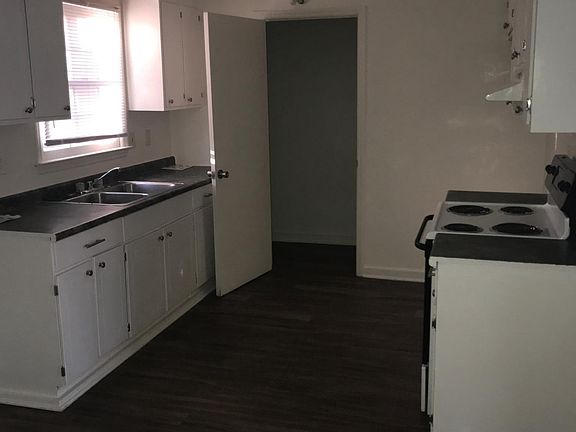 Dining nook view into kitchen & laundry