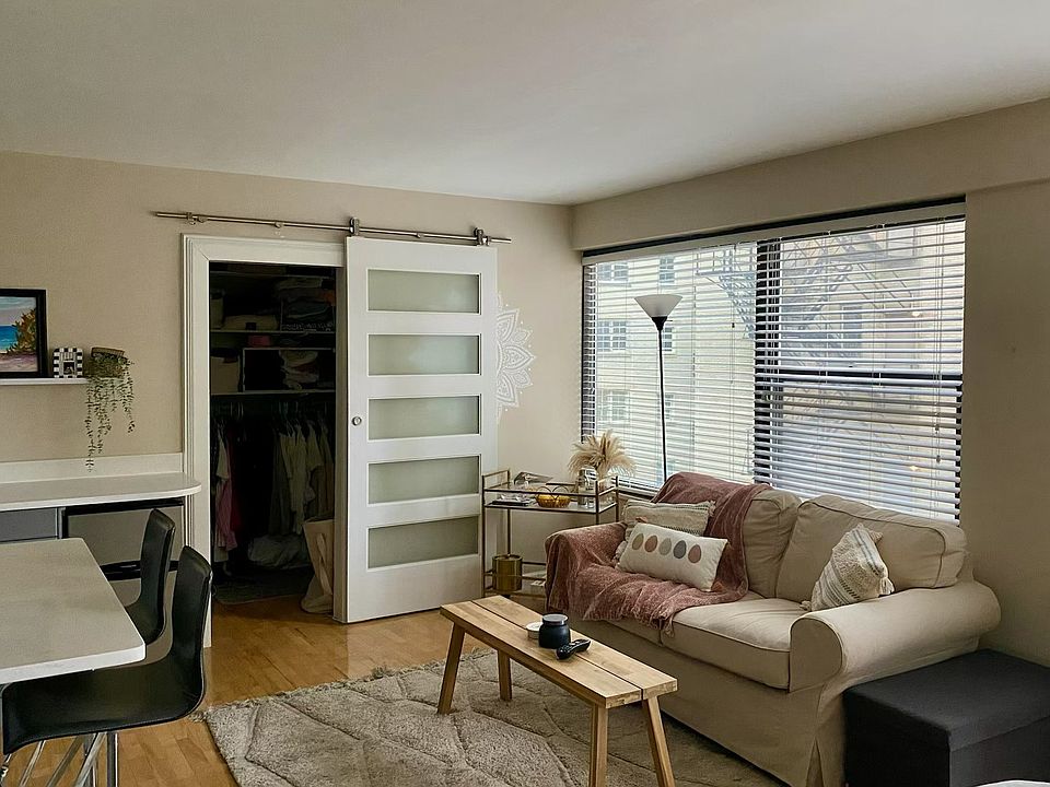 Welcome to the living space, through the sliding barn door is a HUGE walk in closet.