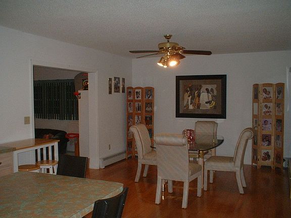 DINING AREA OFF KITCHEN. ALSO HAS FORMAL DINING ROOM.