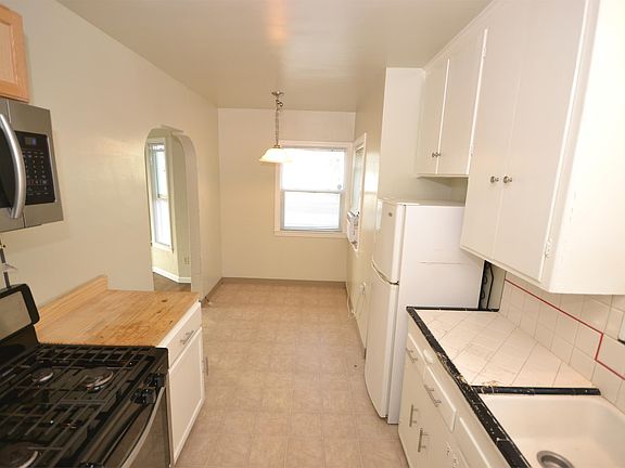 Kitchen and dining room viewed from the utility room