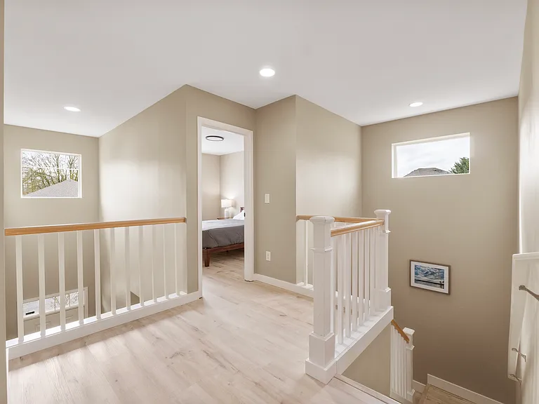 4 bedroom located upstairs along with a Primary bathroom and guest bathroom
