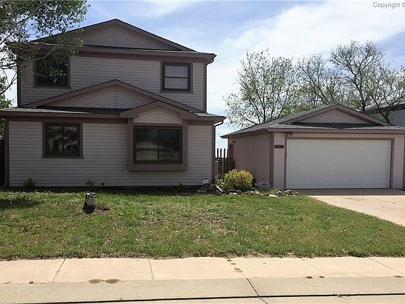 2 story home with detached oversized 2 car garage