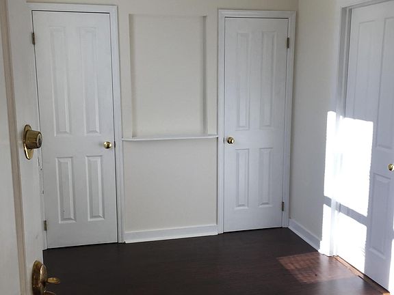 Light filled foyer with 2 closets