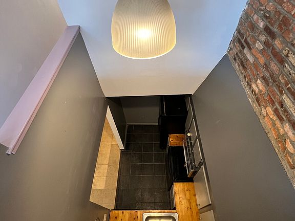 Looking down to the kitchen