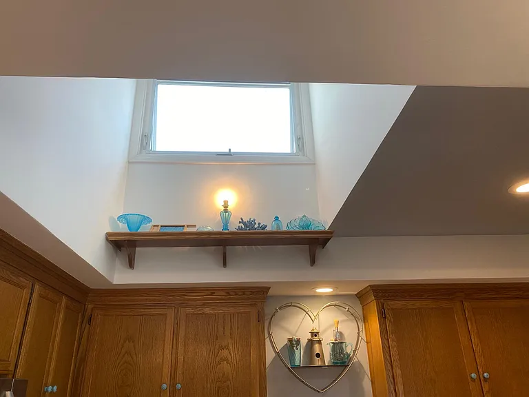 Skylight above Sun Kissed Kitchen Shelf filled w/Vintage Blue DG
