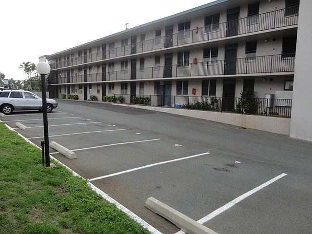 1 assigned uncovered parking stall.