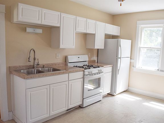 Left side of kitchen, other side is full of cabinetry as wel