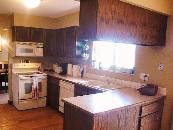 Kitchen with newer appliances and hardwood floor