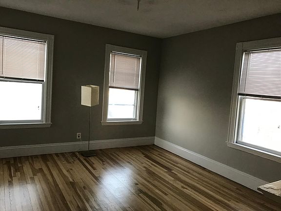 Extra large front room with newcceiling fan light combo on dimmer switch