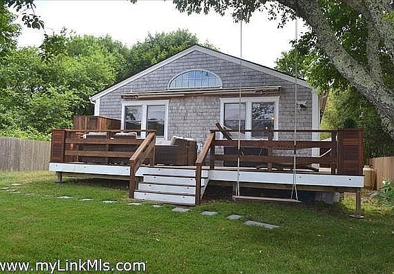 New Mahogany Rear Deck overlooking Fenced in Grass Yard