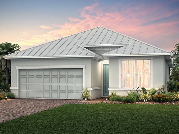 The Fox Hollow, a single-story family home with a 2 car garage, shown with Home Exterior WI2A