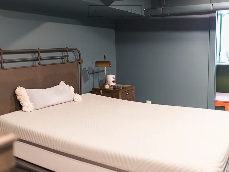 Primary Bedroom with walk in closet and nice closet system