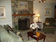 Living room w/ Masonry fireplace