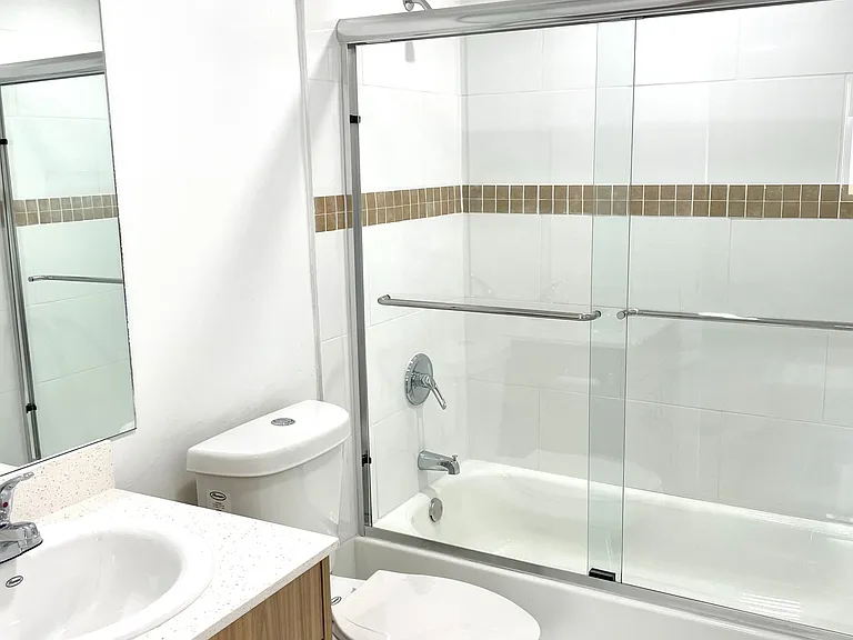 Bathroom with Tub and Glass Doors