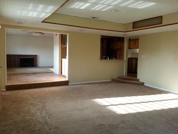 family room looking at living room and kitchen