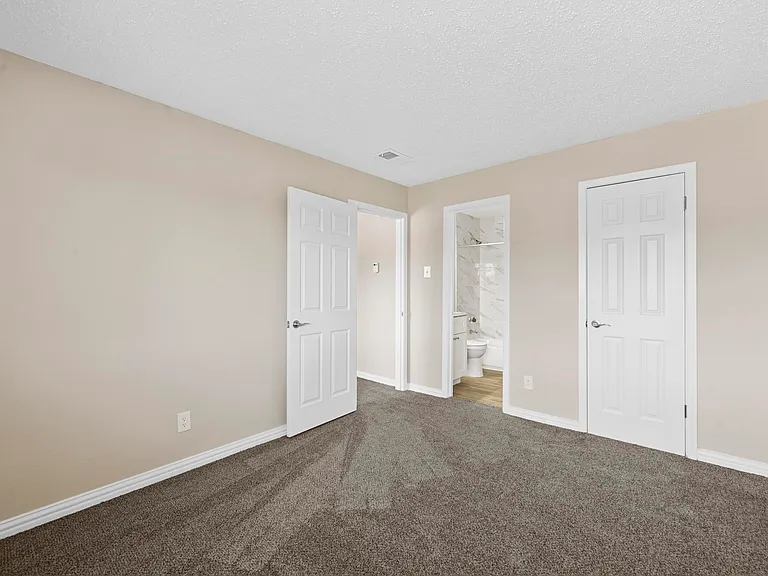Spacious updated bedroom with attached bathroom