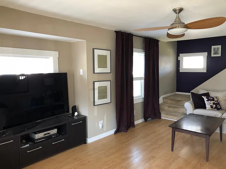 The entire house has been repainted to a neutral color. Accent walls are gone.
