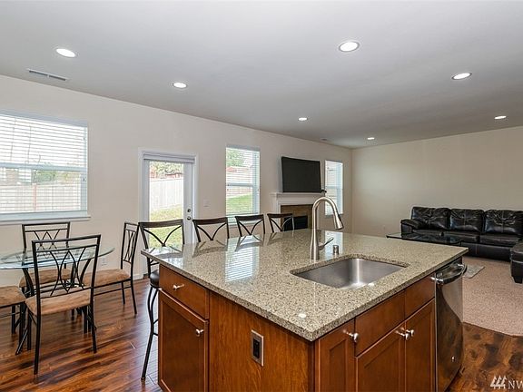 Kitchen View facing Family Room and back door.