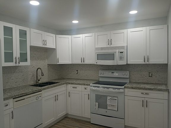 4th image of 4221 W Palm Aire Dr APT 205