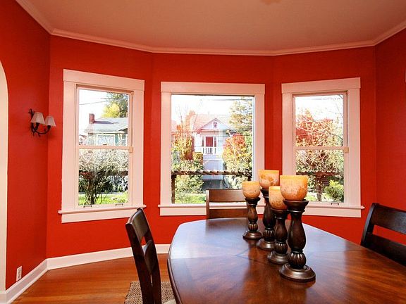 Dining room with dramatic bay windows