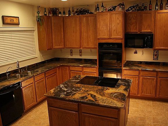 Very Large eat in Kitchen with custom Granite Counters and L